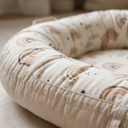 Close detail of the Wren lounger nest bumper stitching and cotton weave
