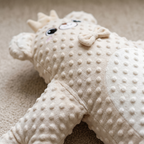 Close detail of the Lull baby patter plush cover texture